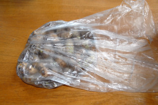 Colocasia tubers in a shopping bag