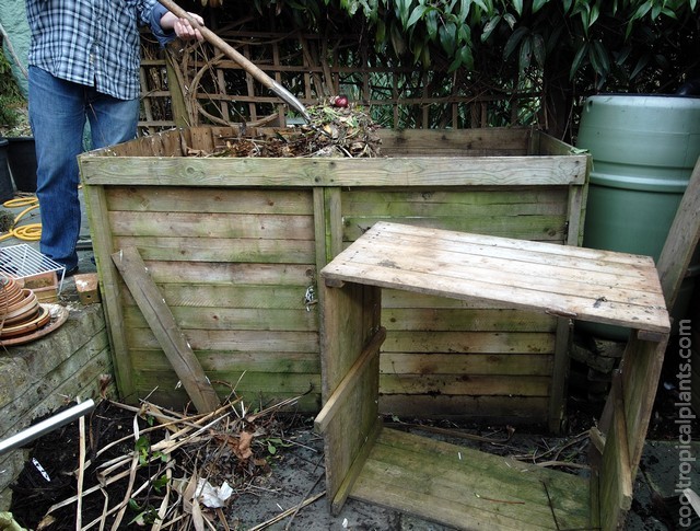 Compost bin contents being turned over