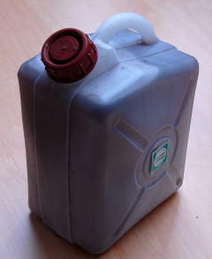 Plastic container filled with sterile water.