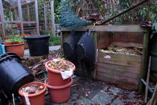 Over filled compost bin.